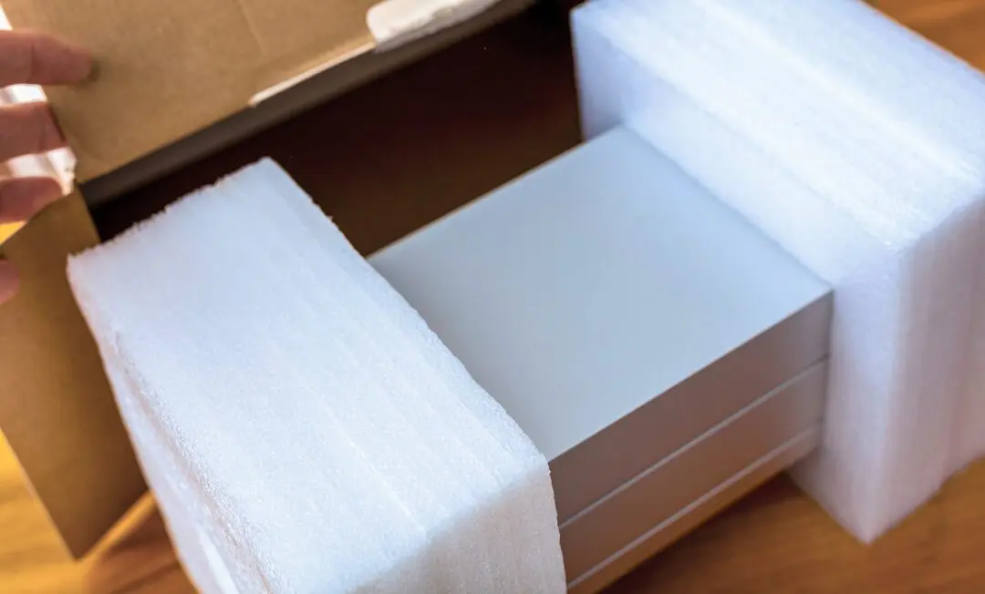 Custom foam packaging insert protecting fragile electronics during shipping